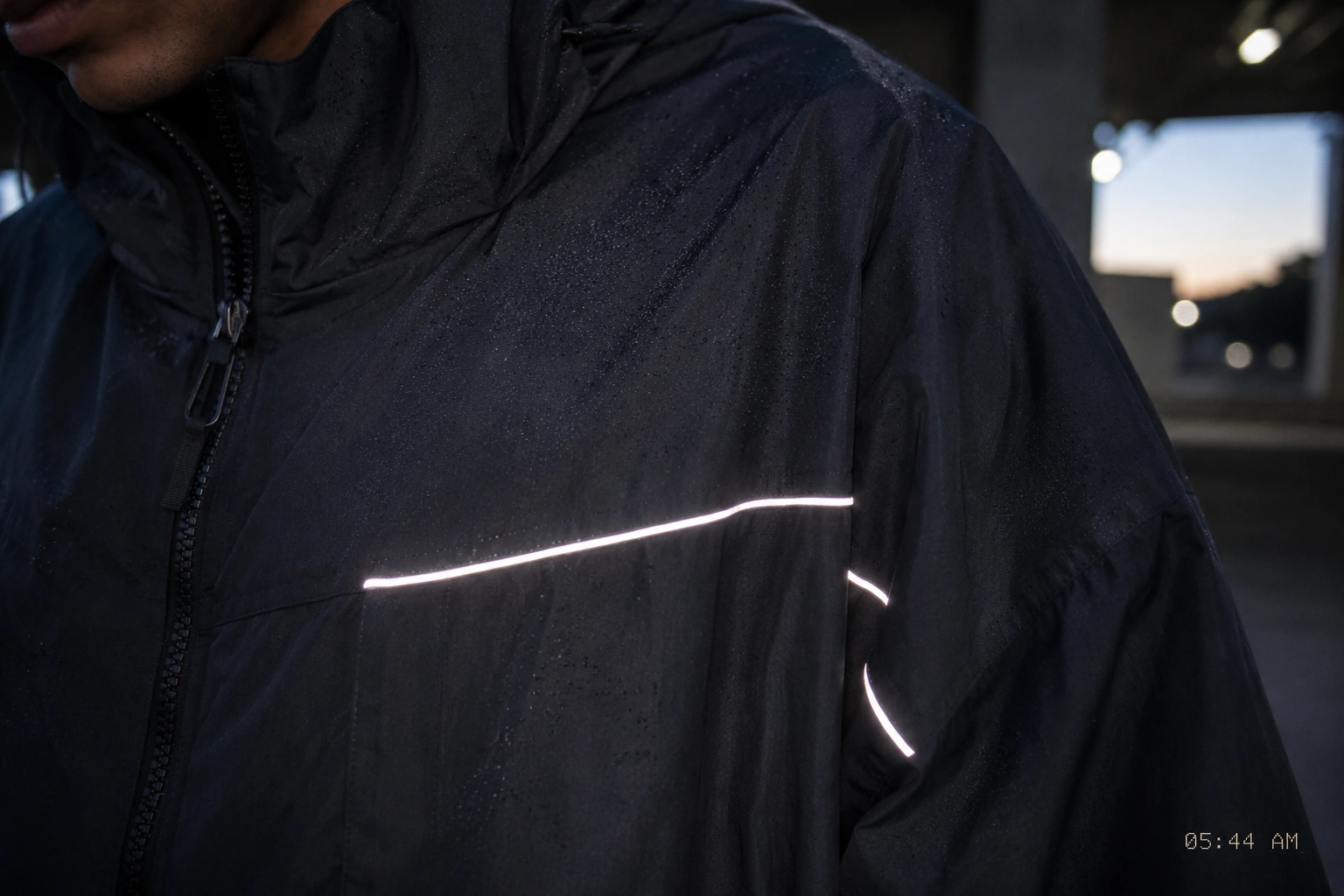 Close detail of the jacket reflective seam at 05:44