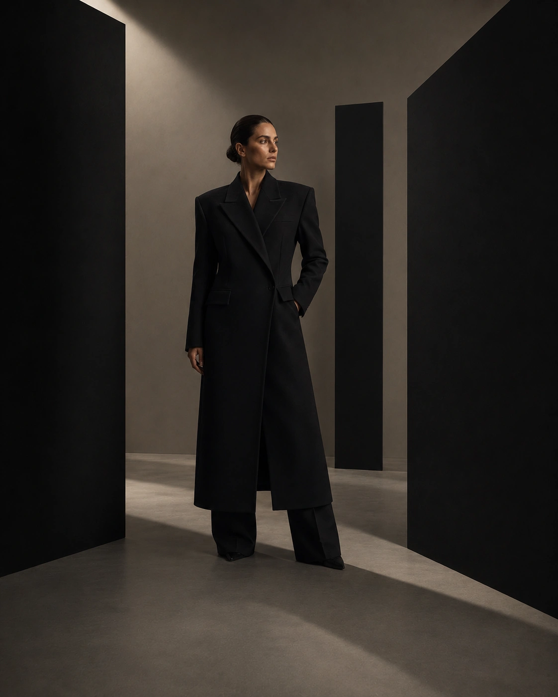 Black tailored silhouette facing into the light