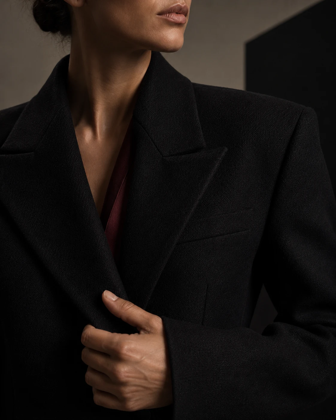 Detail of tailoring and sculptural silhouette